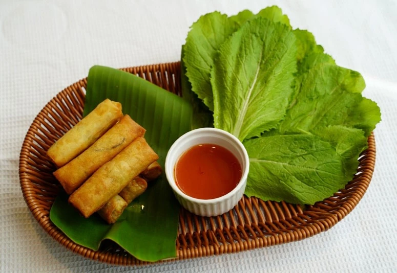 Ram cuốn cải / Cái (Fried spring rolls wrapped in mustard greens/ Peace)